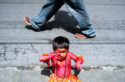 Managua-Nicaragua-A-child-dressed-in-honour-of-the-patron-saint-Santo-Domingo-de-Guzman.jpg