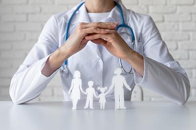 close-up-doctor-and-paper-family.jpg