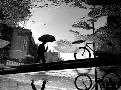 chinatown-new-york-reflections_30732_990x742-e1295868242325.jpg