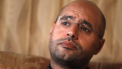 2011-08-21T211301Z_01_SIN88_RTRIDSP_3_LIBYA-GADDAFI-SON.jpg